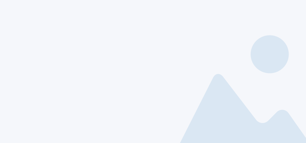 A basic placeholder image. It has a grey background. To the right is a minimalistic sun and mountains in the foreground in a darker grey, with the sun being a circle and the mountains being rounded triangles.